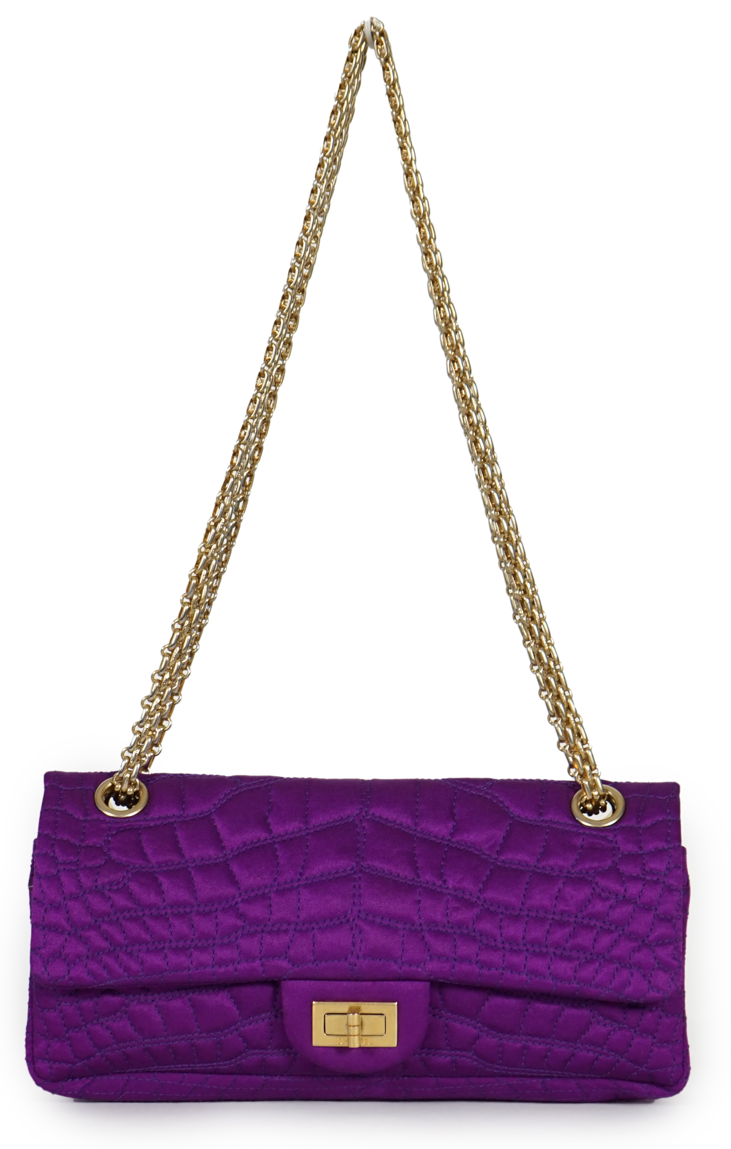 A Chanel medium-sized 2-55 bag in purple silk satin stitched with a quilted crocodile pattern, width 24cm, height 15cm, depth 6cm Single handle 112cm, Double handles 65cm